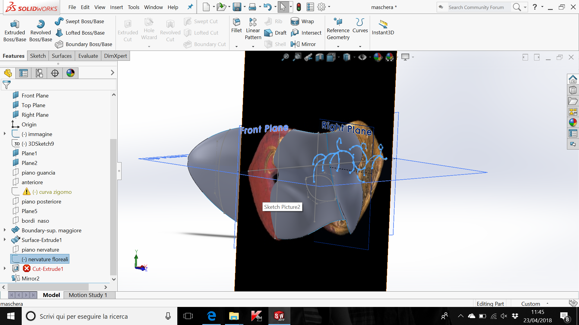 How to create a complex emboss on Solidworks? (pictures in the link