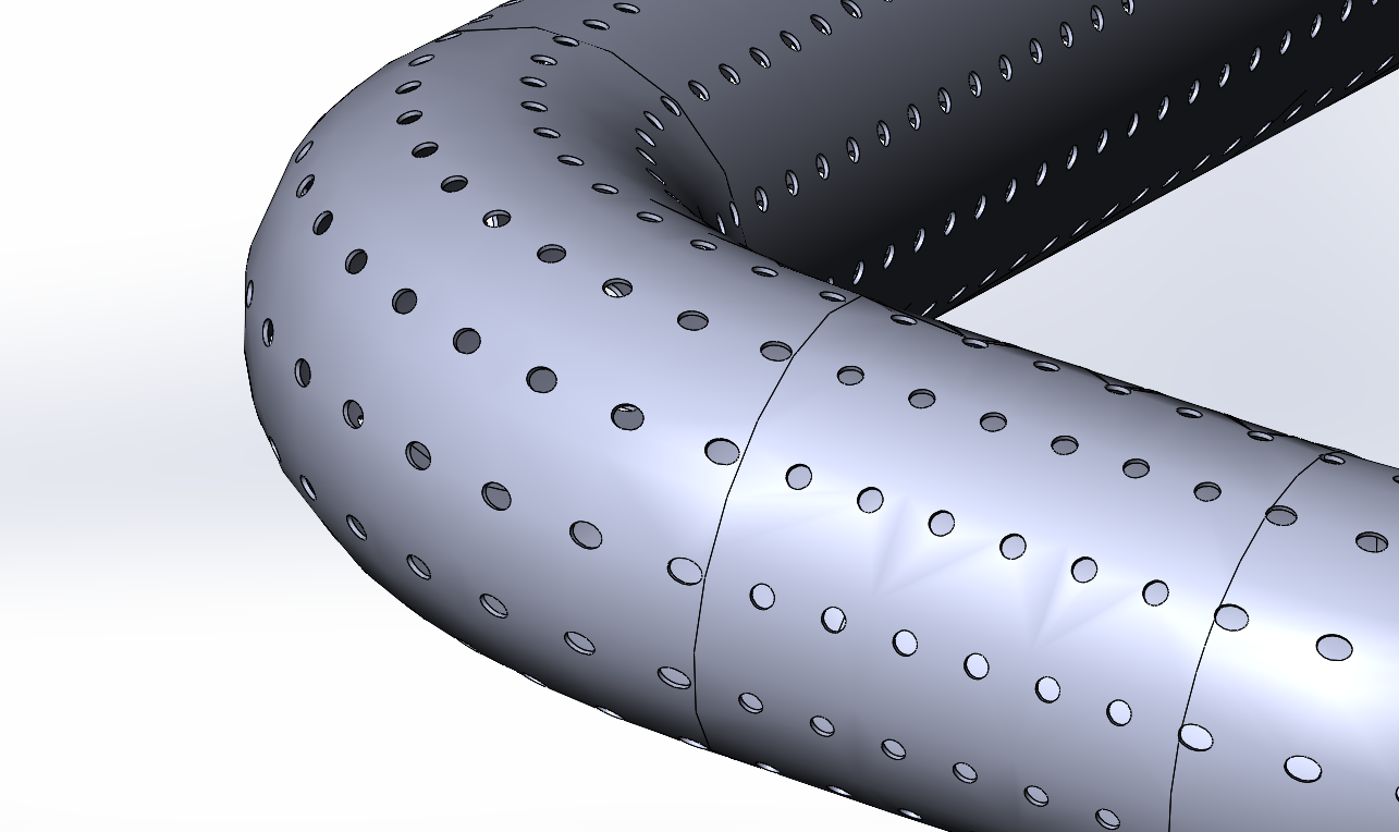 How can i create hole on that curved part of the pipe uniformly ...