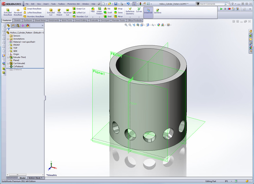 How to cut holes throughout the curved surface of a cylinder? GrabCAD