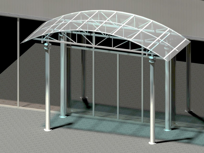 Building entrance with arch canopy.