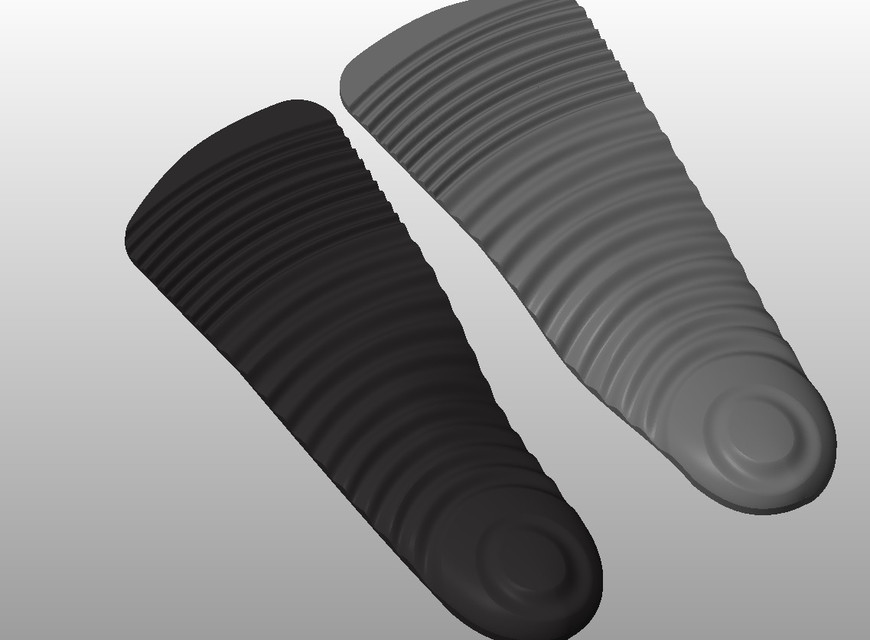 Shoe inserts with controlled concentric bending pattern